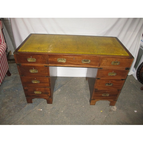 316 - A campaign style 9 drawer pedestal desk, comes in 3 parts for ease of transport, approx. size H 77cm... 