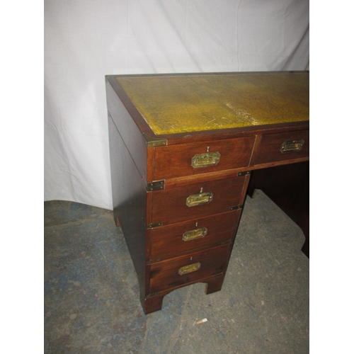 316 - A campaign style 9 drawer pedestal desk, comes in 3 parts for ease of transport, approx. size H 77cm... 