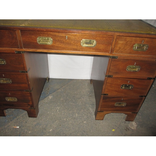 316 - A campaign style 9 drawer pedestal desk, comes in 3 parts for ease of transport, approx. size H 77cm... 