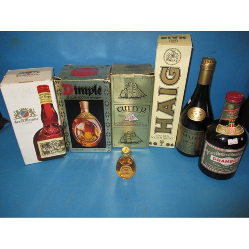 340 - 7 bottles of alcoholic drink to include, Cutty Sark 12 year old whisky and a boxed Dimple whisky, al... 