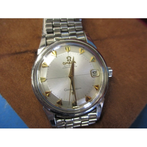 109 - A 1961 Omega Constellation automatic chronograph with date window, having original box paperwork and... 