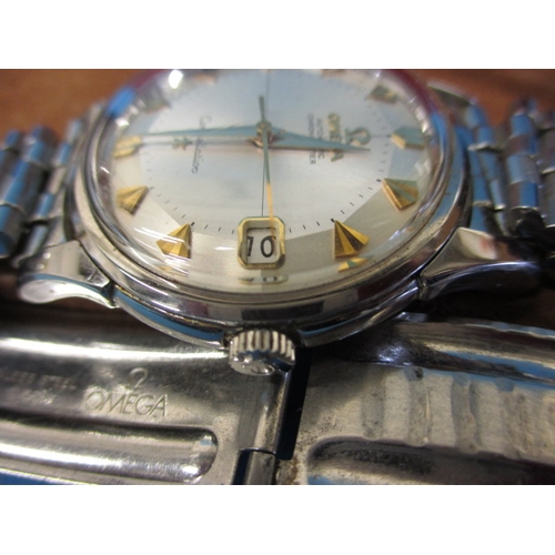 109 - A 1961 Omega Constellation automatic chronograph with date window, having original box paperwork and... 