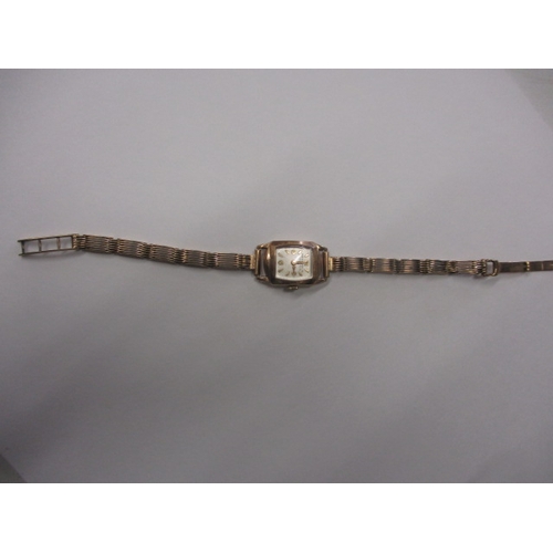 103 - A vintage ladies 9ct gold watch and strap, the dial marked Winegartens Ltd, approx. gross parcel wei... 