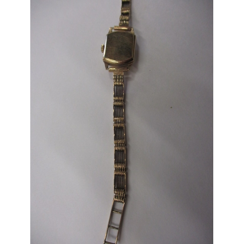 103 - A vintage ladies 9ct gold watch and strap, the dial marked Winegartens Ltd, approx. gross parcel wei... 