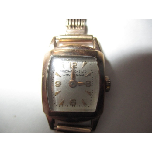 103 - A vintage ladies 9ct gold watch and strap, the dial marked Winegartens Ltd, approx. gross parcel wei... 