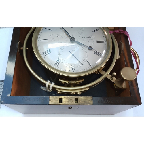 284 - An antique 8 day marine chronometer by Clement Harris 86 Cornhill, London, components and key marked... 