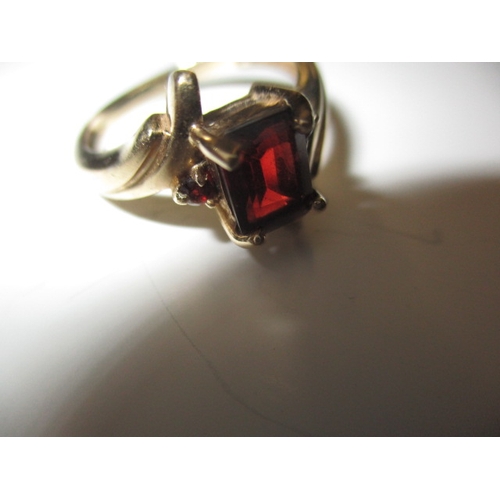 2 - A vintage 9ct gold and garnet dress ring, approx. ring size ‘N+’ Approx weight 2.8g in useable pre-o... 