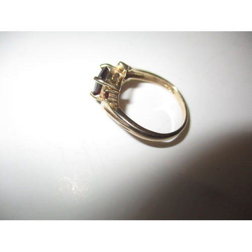 2 - A vintage 9ct gold and garnet dress ring, approx. ring size ‘N+’ Approx weight 2.8g in useable pre-o... 