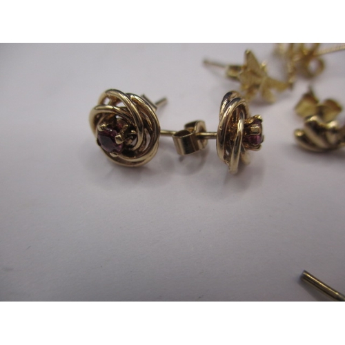 80 - A parcel of gold and yellow metal earrings, most in pairs, all in used condition, approx. gross parc... 