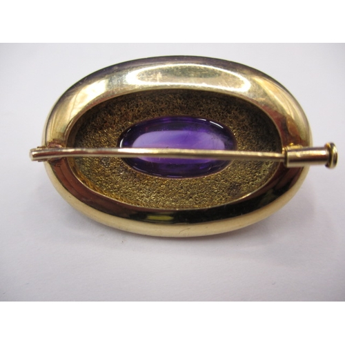 82 - A vintage 14ct gold brooch with large central amethyst, approx. gross weight 7.2g in useable pre-own... 