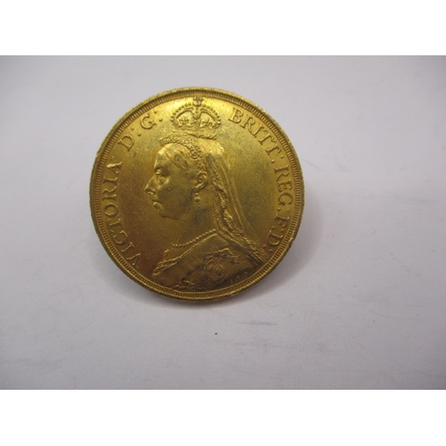 155 - A Victorian gold double sovereign dated 1887, a circulated coin with very fine definition of feature... 