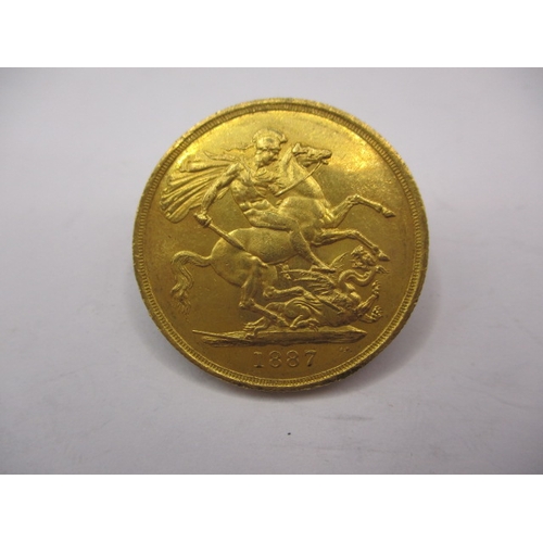 155 - A Victorian gold double sovereign dated 1887, a circulated coin with very fine definition of feature... 