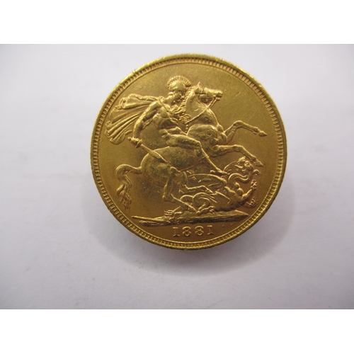 140 - A Victorian gold sovereign dated 1881, Melbourn mint, a circulated coin with very fine definition of... 