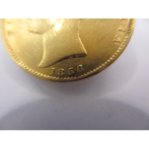 141 - A Victorian gold sovereign dated 1856, Shield back, a circulated coin with very fine definition of f... 