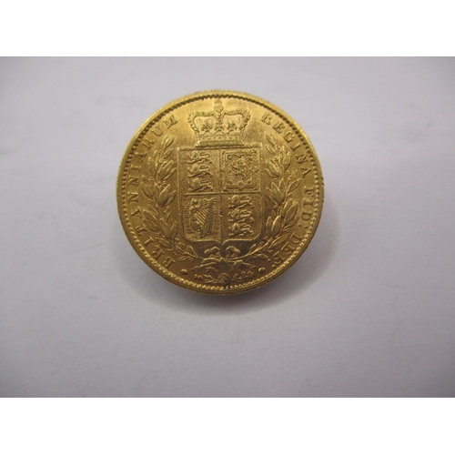 141 - A Victorian gold sovereign dated 1856, Shield back, a circulated coin with very fine definition of f... 