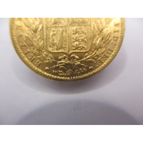 141 - A Victorian gold sovereign dated 1856, Shield back, a circulated coin with very fine definition of f... 