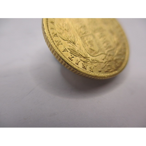 141 - A Victorian gold sovereign dated 1856, Shield back, a circulated coin with very fine definition of f... 