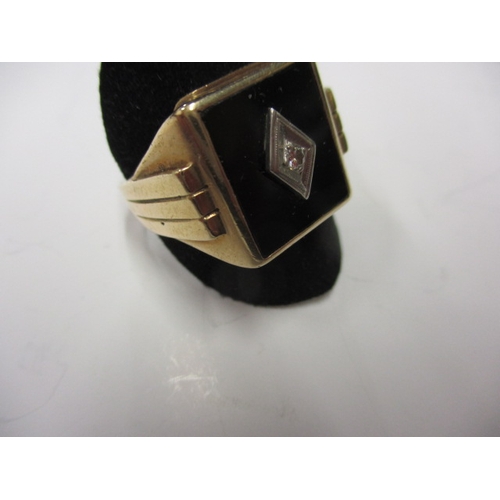 44 - A vintage 10k gold signet ring with central diamond, approx. ring size ‘U’, approx. weight 5.2g in g... 