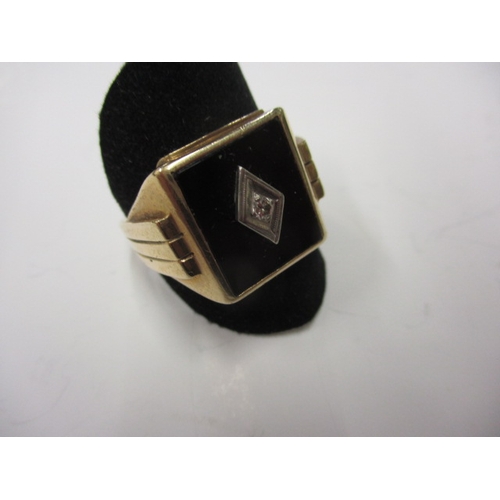 44 - A vintage 10k gold signet ring with central diamond, approx. ring size ‘U’, approx. weight 5.2g in g... 