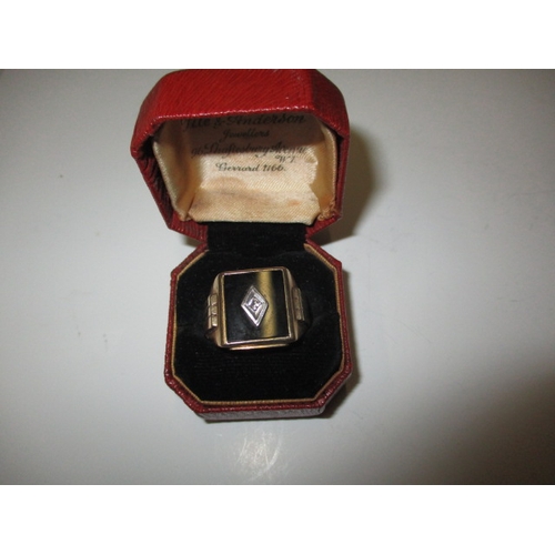 44 - A vintage 10k gold signet ring with central diamond, approx. ring size ‘U’, approx. weight 5.2g in g... 