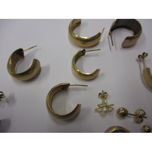 76 - A parcel of gold and yellow metal earrings, approx. gross parcel weight 16.5g all in used condition ... 