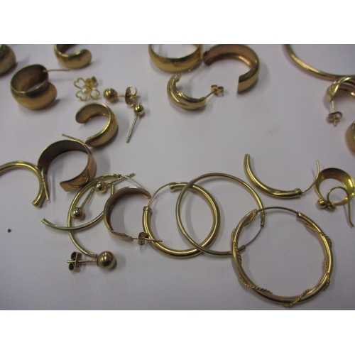 76 - A parcel of gold and yellow metal earrings, approx. gross parcel weight 16.5g all in used condition ... 