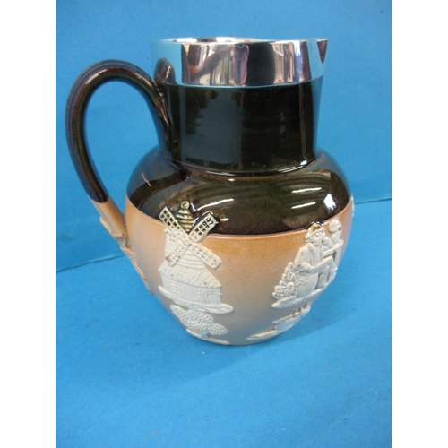 265 - A Doulton Lambeth stoneware harvest jug with silver rim, approx. height 16.5cm in good pre-owned con... 