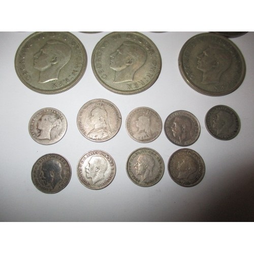 192 - A parcel of pre-decimal silver and part silver coins, all in circulated condition, approx. gross par... 