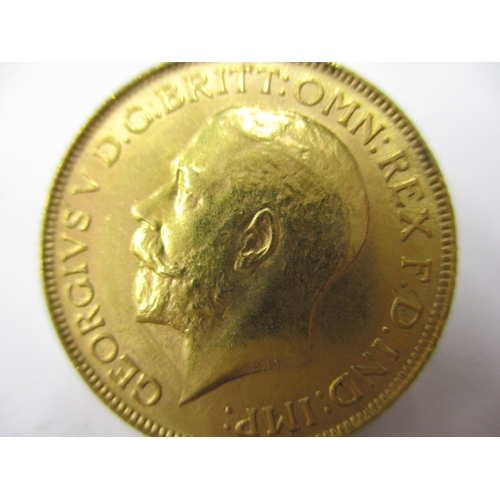 137 - A George V gold sovereign dated 1925, a circulated coin with extra fine definition of features