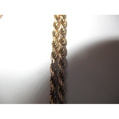 97 - A 9ct gold rope chain with coin mount pendant, approx. linear length 60cm ,approx. gross parcel weig... 