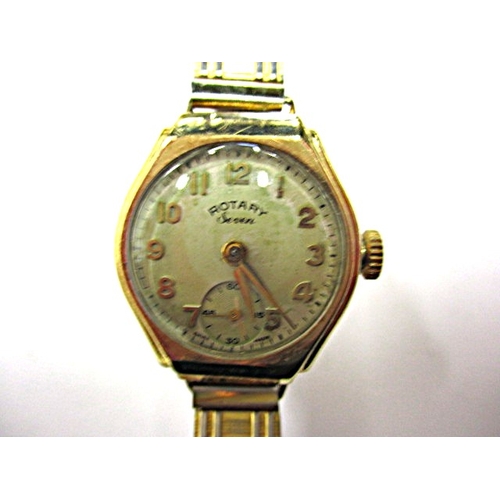 105 - A vintage ladies 9ct gold Rotary Seven wrist watch, with later expanding strap, runs when wound