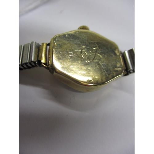 105 - A vintage ladies 9ct gold Rotary Seven wrist watch, with later expanding strap, runs when wound