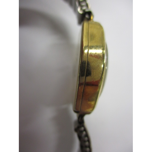 105 - A vintage ladies 9ct gold Rotary Seven wrist watch, with later expanding strap, runs when wound