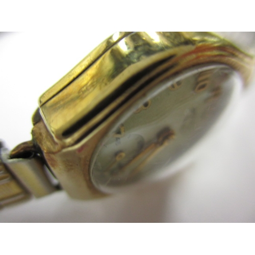 105 - A vintage ladies 9ct gold Rotary Seven wrist watch, with later expanding strap, runs when wound