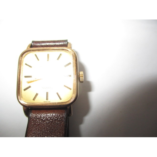 104 - A 1980s Garrards 9ct gold watch in original Garrard & CO box, having dedication on back from Ford mo... 