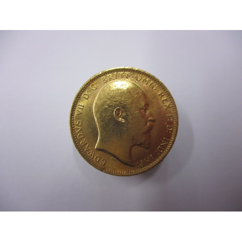 174 - An Edward VII gold sovereign dated 1906, a circulated coin with fine definition of features