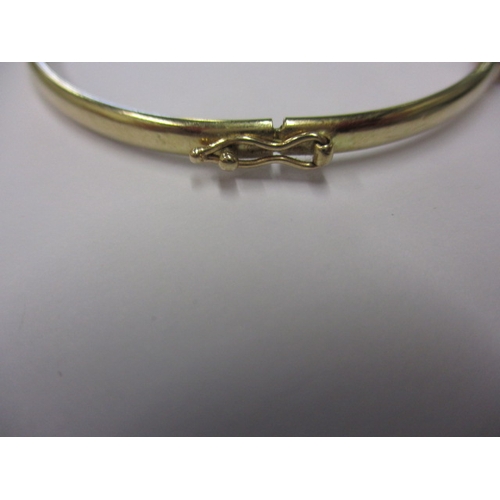 71 - A vintage 9ct gold diamond and amethyst bangle, with working clasp, approx. weight 4.3g