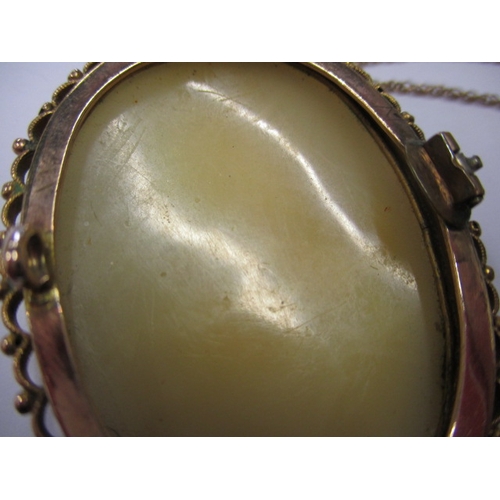 73 - A vintage Italian carved shell cameo with 9ct gold mount and chain, brooch pin missing, approx. gros... 