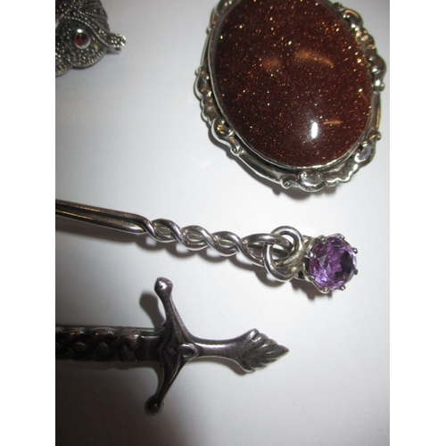 156 - A parcel of silver and white metal jewellery and other items, to include a vintage nurses belt buckl... 