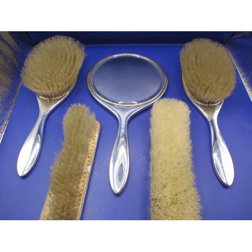 137 - A sterling silver 5 piece dressing table set, Hallmarked Birmingham c1927, in useable pre-owned cond... 