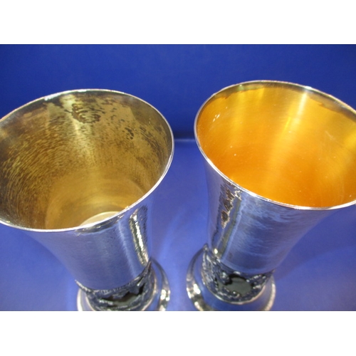 139 - Two 1970s limited edition sterling goblets with parcel gilt decoration, one for New forest number 94... 