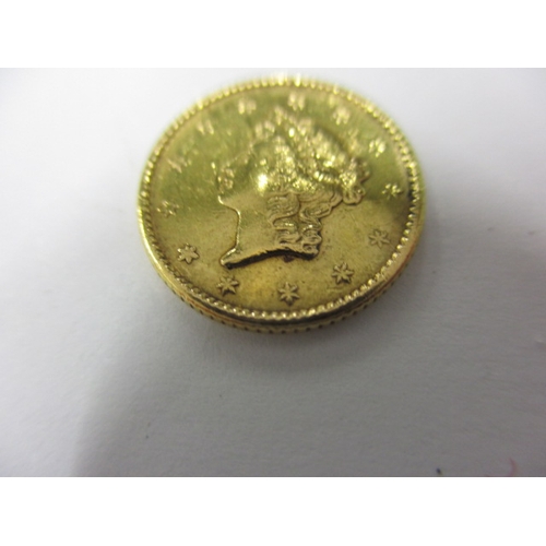 176 - A United States of America gold one dollar coin dated 1852, a circulated coin with fine definition o... 