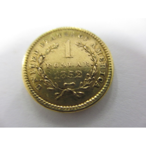 176 - A United States of America gold one dollar coin dated 1852, a circulated coin with fine definition o... 