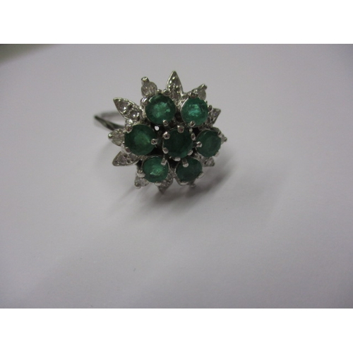 5 - A 750 white gold diamond and emerald cluster ring, approx. ring size ‘Q+’ approx. weight 6g, in good... 