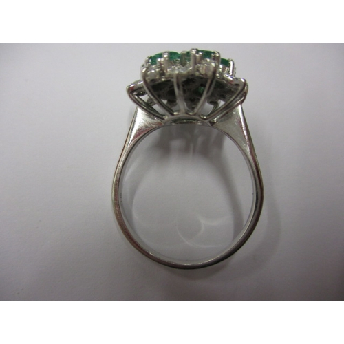 5 - A 750 white gold diamond and emerald cluster ring, approx. ring size ‘Q+’ approx. weight 6g, in good... 