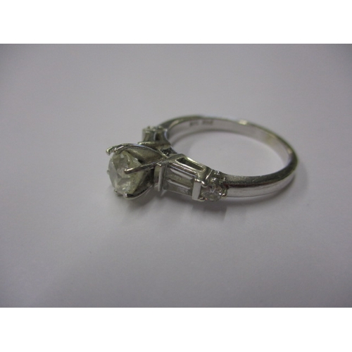 6 - A vintage 585 white gold diamond solitaire ring with diamond set shoulders, approx. ring size ‘O+’, ... 