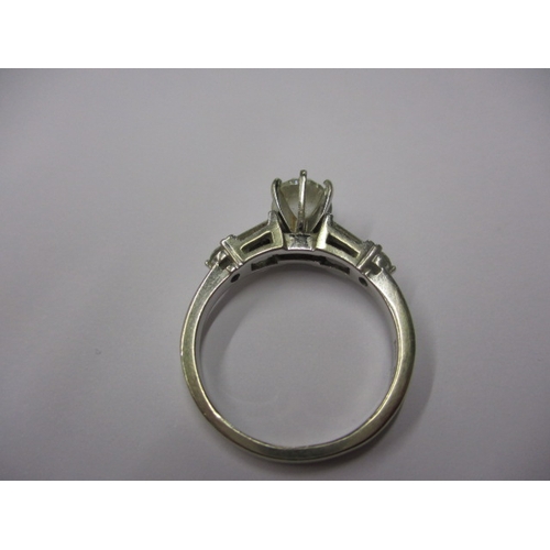 6 - A vintage 585 white gold diamond solitaire ring with diamond set shoulders, approx. ring size ‘O+’, ... 