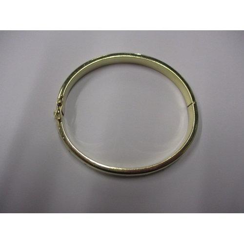 78 - A vintage 9ct yellow gold and diamond wrist bangle, approx. weight 12g in useable pre-owned conditio... 