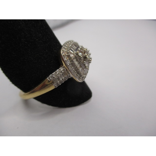 12 - An 18ct yellow  gold diamond dress ring, approx. ring size ‘V’, approx. weight 4.8g, in good pre-own... 