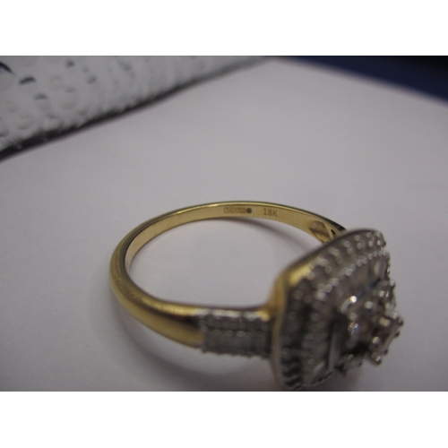 12 - An 18ct yellow  gold diamond dress ring, approx. ring size ‘V’, approx. weight 4.8g, in good pre-own... 